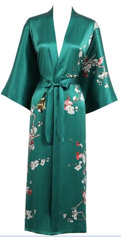 100% Pure Silk Kimono. Digitally printed with a traditional Japanese Cherry Blossom pattern. Wide sleeves, oblique pockets on each side, belted at the waist and with a hanging hook at the collar. French seams throughout.