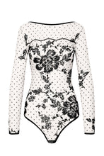 Load image into Gallery viewer, This is a super fine, sheer mesh body with black luxurious embroidered details to the front. it has long sleeves, g/string back (for smoothness) are velvet trimmed.  It is super soft and comfortable. This is a very sexy garment, perfect as outwear and underwear.
