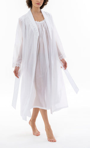 Full length (128cm) Shawl Collar robe.   Made in Germany from the finest mousseline, this full length, diaphanous dressing gown is a 100% pure cotton. The Shawl Collar has a lace trim. The generous sleeves have a wide lace trim at the cuff. It is belted and with a side pocket. This robe offers the wearer perfect cover without heaviness.