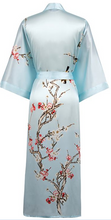 Load image into Gallery viewer, 100% Pure Silk Kimono. Digitally printed with a traditional Japanese Cherry Blossom pattern. Wide sleeves, oblique pockets on each side, belted at the waist and with a hanging hook at the collar. French seams throughout.
