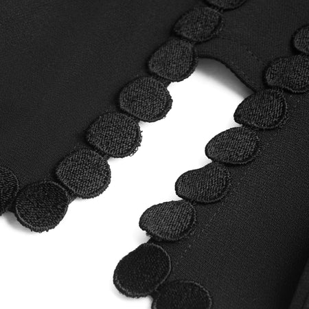 This is a beautiful corset made the French way. It has a square neckline at the front with a Twill embellishment detail around its edges. The clever hidden boning and panelling that draws in the waist and supports the bust. The matt black continues around the back. where there is a centred zip. This is a stunning garment. It is perfect for day and evening wear