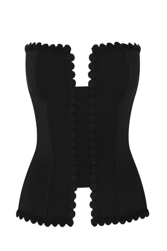 This is a beautiful corset made the French way. It has a square neckline at the front with a Twill embellishment detail around its edges. The clever hidden boning and panelling that draws in the waist and supports the bust. The matt black continues around the back. where there is a centred zip. This is a stunning garment. It is perfect for day and evening wear