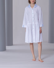 Load image into Gallery viewer, Incredibly stylish flannel short button through Short Robe. The collar, cuffs buttons all have a cornflower blue pattern which adds lightness and chicness to this beautiful garment. It may be worn as a dressing gown over the matching pyjamas or as a stand alone nightshirt...your choice!
