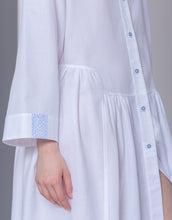 Load image into Gallery viewer, Incredibly stylish flannel short button through Short Robe. The collar, cuffs buttons all have a cornflower blue pattern which adds lightness and chicness to this beautiful garment. It may be worn as a dressing gown over the matching pyjamas or as a stand alone nightshirt...your choice!
