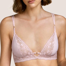 Load image into Gallery viewer, Gorgeous, simple, gentle and soft non-wire bra. Perfect for the smaller bust yet makes a feminine statement. Leavers lace and a modal-silk with a touch of Lycra gives a soft touch to beautiful garment.  An added feature is the clips at the back which can be adjusted to create a racer back style.  Fabric: Modal: 57%, Polyamide: 22%, Silk: 10%, Elastane: 9%, Cotton: 2%. Rose Mist.

