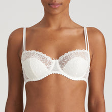 Load image into Gallery viewer, BEST SELLER &amp; back again by popular demand!  A half lace, half formed cup balconnet bra. This bra all the benefits of a lace bra but also all the shape and cover of a formed cup bra. It is a win-win situation. The final icing on the cake is the delicate two strap detail which has all the strength of a wider strap without the bulk.   Fabric content: Polyamide: 49%, Polyester: 34%, Elastane: 17%. Ivory.
