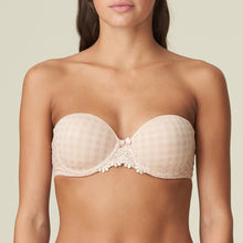 Load image into Gallery viewer, Strapless formed cup underwire bra with a balconnet line. Straight back with silicone strip to give extra support when the bra is worn strapless. Excellent shape and support for those strapless occasions. May also be worn in a halter style. The signature daisy straps complete the picture!  Fabric Content: Polyamide: 49%, Polyester: 41%, Elastane: 10%
