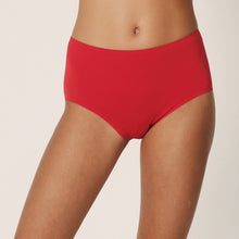 Load image into Gallery viewer, Perfect fit and comfort thanks to these high briefs without visible seams or stitching. The soft microfibre fits snugly over the bum and offers light control on the tummy. A fine glossy border on the waist adds a luxurious touch. No label on the inside and with a soft cotton gusset. These briefs are worn high on the tummy and rest on the hip to elongate the legline.  Fabric Content: Polyamide: 79%, Elastane:15%, Polyester: 4%, Cotton: 2%. SCARLET.
