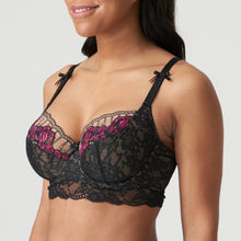 Load image into Gallery viewer, Bustier style underwire bra in black lace with complementary fuchsia pink embroidery. The balconnet tulip cut offers excellent support, especially to the larger cup size. This retro style bra with roses and tulle back is the perfect piece for this winter&#39;s wardrobe. Bow details on the straps complete the contemporary yet timeless look.
