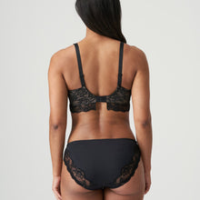 Load image into Gallery viewer, Bustier style underwire bra in black lace with complementary fuchsia pink embroidery. The balconnet tulip cut offers excellent support, especially to the larger cup size. This retro style bra with roses and tulle back is the perfect piece for this winter&#39;s wardrobe. Bow details on the straps complete the contemporary yet timeless look.
