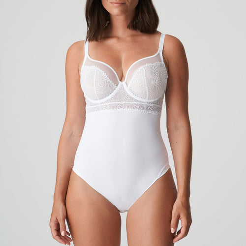 Pure White. This body is simply irresistible. It is elegant with the look of a bustier style long line bra. The plunge mesh gives the illusion of lightness but offers full support. The flowered embroidery lace has an edgy tattoo effect.  Fabric: Polyamide: 56%, Elastane: 33%, Polyester: 9%, Cotton: 2%