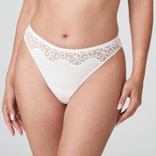 Load image into Gallery viewer, A G/String in a soft, printed fabric with delicate embroidery on waistband. The feminine, ivory colour is perfect under light-coloured summer outfits. Pure elegance!  Fabric content: Polyamide: 61%, Elastane: 15%, Polyester:15%, Cotton: 9%
