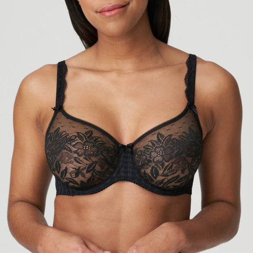 Black lace effect bra but with a perfect seamfree smooth finish even under t-shirts. The moulded cup give a lovely natural shape combined with excellent support. 