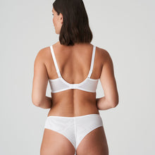Load image into Gallery viewer, Pure White. This underwire bra is feminine, comfortable, and super-luxurious. The tonal colour creates an edgy tattoo effect. The removable extra straps accentuate your feminine cleavage. Looks wonderful under a V-neck top or dress. The embroidered lace is both soft and supple. The bra is 3 panelled and fully supportive.  Fabric: Polyamide: 60%, Polyester: 25%, Elastane:15%
