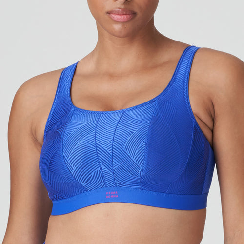 Electric Blue fantastically supportive non-wire bra. It offers versatile support and extreme comfort. Adjustable straps, with hooks and eyes. The delicate printed cups and straps have a cross-back or straight option. Three-part cup for extra support. Padded straps and closure. No irritation seamless cup. Anti-chafing super soft elastic banding.   The performance fabric uses highly breathable technology to keep you cool, fresh and dry. Fabric Content: Polyamide: 45%, Polyester: 42%, Elastane:13%