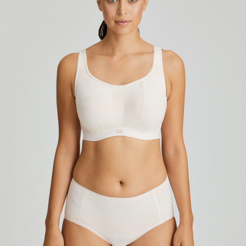 Fantastically supportive underwired Sports bra. It offers versatile support and extreme comfort.  Adjustable straps, with hooks and eyes. With a graphic detail on the cups and straps, they have a cross-back or straight option. Three-part cup for extra support. Padded straps and closure. No irritation seamless cup. Anti-chafing super soft elastic banding.  