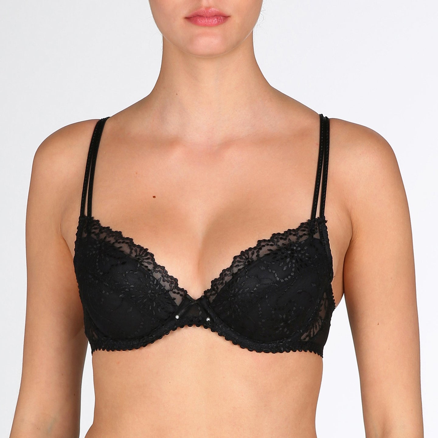 BEST SELLER! An all-lace plunge bra with removable pads to the C cup. This gorgeously shaped bra adds cleavage to any bust size. The double delicate straps give extra support without bulk. The removable pads (in A to C) allow the wearer to adjust the uplift. This bra lifts and centres the bust to give the ultimate cleavage. D - E cups are a formed plunge but without a pad. Fabric content: Polyamide: 54%, Polyester: 32%, Elastane: 14%. Black.