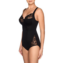 Load image into Gallery viewer, A luxurious figure-fixing body with three-section underwire, finished with abundant embroidery on cups, straps, leg openings and front section. The firm cups give an excellent lift while the side sections on the cups nudge the bust towards the centre. The cups also are deeper than any other Prima Donna bra, which ensures better uplift for largest sizes. The central section of the body smoothes away lumps and bumps on tummy and waist, creating a flowing figure. Black.
